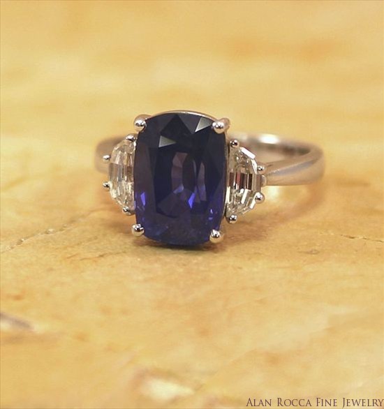 Cushion Shaped Blue Sapphire Classic Cocktail Ring with Trapezoid Diamond Side Stones