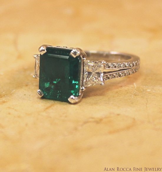 Radiant Cut Emerald with Trapezoid and Round Cut Diamonds