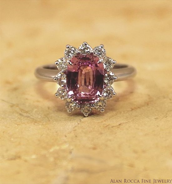 Cushion Shaped Pink Sapphire Classic Cocktail Ring with Halo of Prong Set Round Diamonds