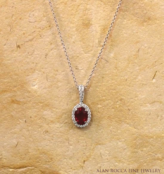 Oval Ruby Pendant with Prong Set Round Diamonds